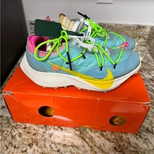 Nike Blue and Yellow Sneakers with Pink and Green Accents